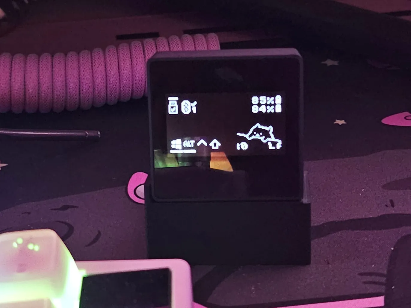 OLED screen close-up showing layer status